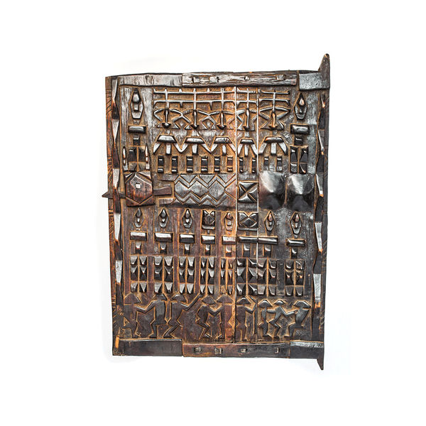 Dogon Door, a door panel carved from wood darkened by fire by the Dogon people of Mali, with rows of carved figures