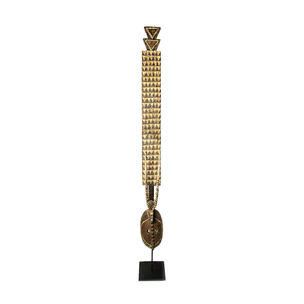 Mossi Tribe Mask, a tall Mossi plank mask carved from wood in Burkina Faso, covered in rows of small triangles, on a stand