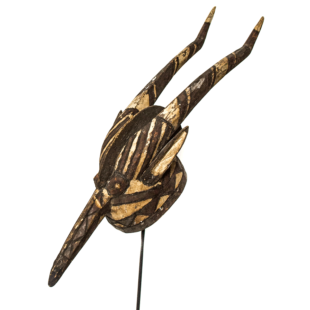 Mossi Tribe Mask, a Mossi antelope mask carved from wood in Burkina Faso, painted black and white with two long curved horns