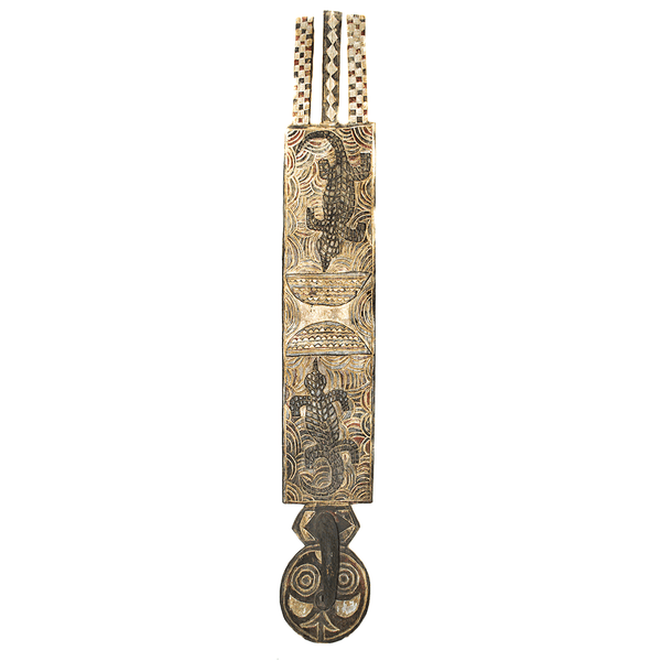 Plank Mask, a Bwa plank mask carved from wood in Burkina Faso, with two crocodiles carved on a tall board above a round face