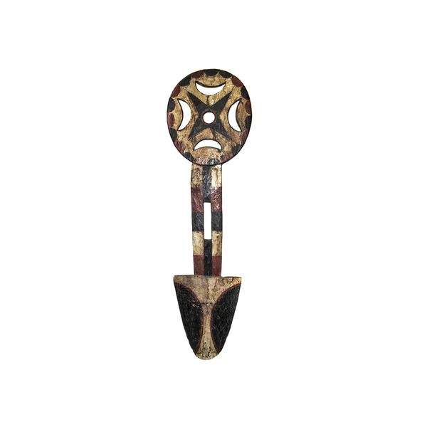 Bedu Mask, a Nafana mask carved from wood in the Ivory Coast, painted red, black and white with moon shapes cut out
