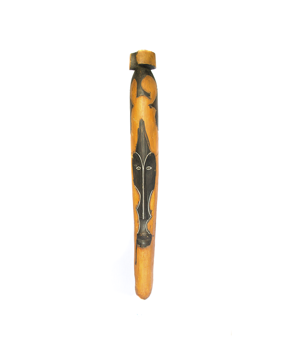 Fang Mask, a long Fang mask carved from wood in Cameroon, painted orange with a narrow black face and white-rimmed eyes