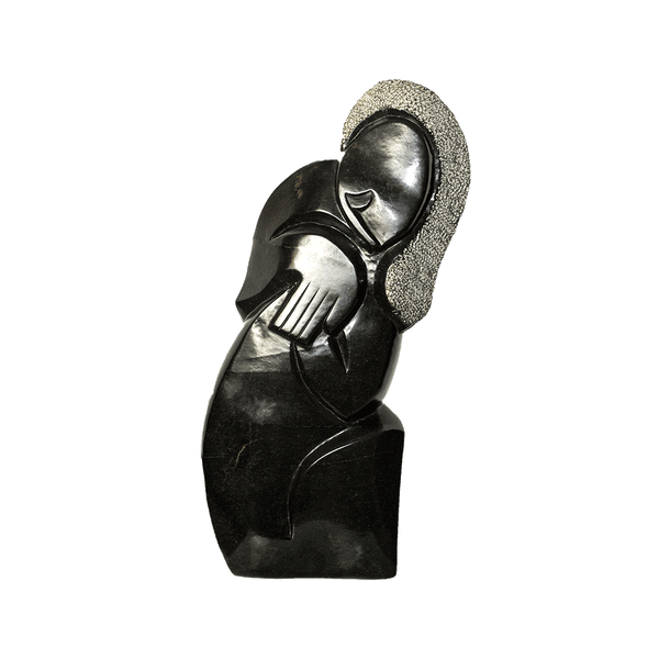 Prayer, a Shona stone sculpture carved from spring stone in Zimbabwe by Joseph Chigangaidze