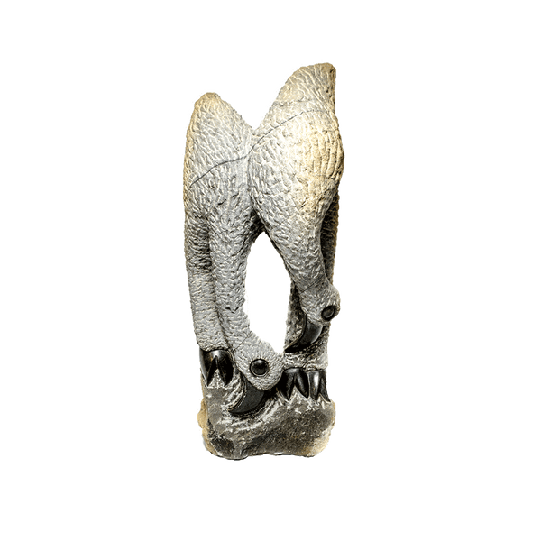 Couple, a Shona stone sculpture carved from spring stone in Zimbabwe by Tinashe Makaza, two birds bowing their heads