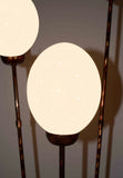 Five Egg Ostrich Egg Lamp, a floor lamp made from ostrich eggs and painted metal in South Africa, seen up close