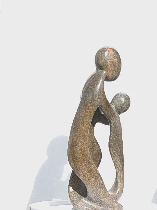 Family of Three turning on a stand, video