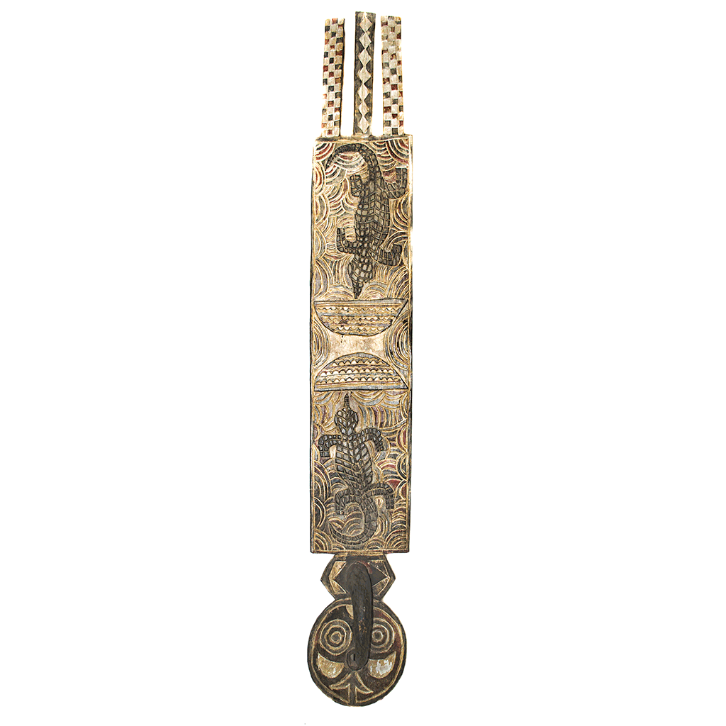 Plank Mask, a Bwa plank mask carved from wood in Burkina Faso, with two crocodiles carved on a tall board above a round face