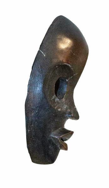 Profile view: Authentic 'Dan Mask' from the Ivory Coast Made in 1978