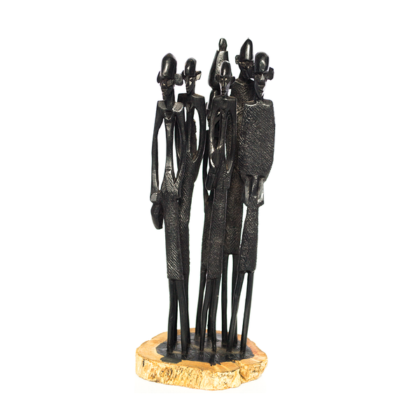Masaai People, six Masaai figures standing close as a family, carved from ebony wood in Kenya by the artist Nelson