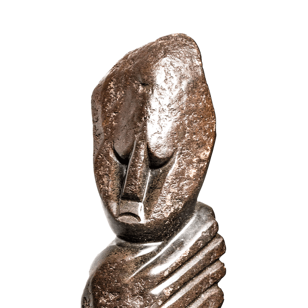 Gentle Lady, a Shona stone sculpture carved from spring stone in Zimbabwe by Denny Kanyemba