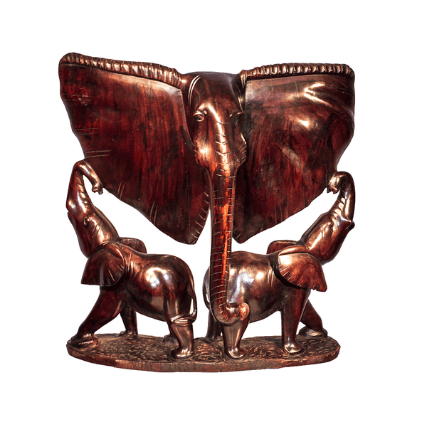 Mother and Children, a mother elephant with two calves beneath her ears, carved from one piece of ebony wood in Kenya